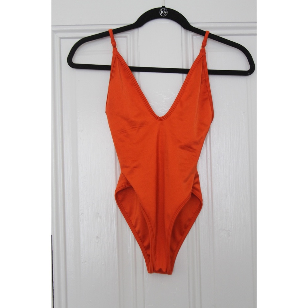 High leg red one piece